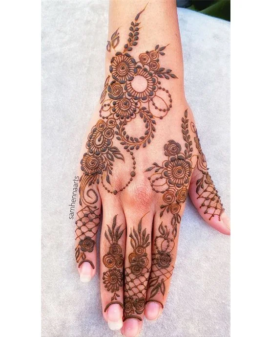 Dreamy Harmony Blending Into Wave Back Hand Mehndi Design